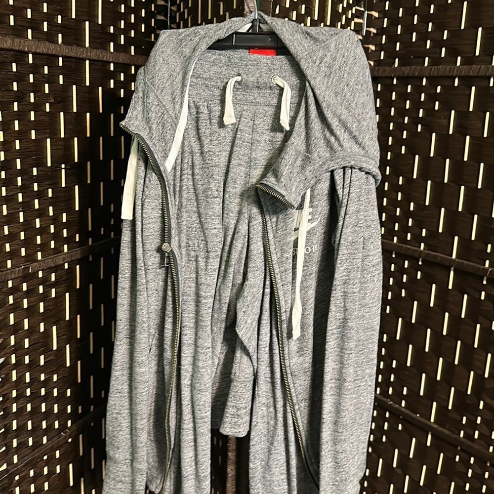 A two piece set made by Nike hoodie jacket and capri style pants